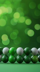 Poster - Abstract green and white spheres arranged in a row with a bokeh background, creating a modern and vibrant visual effect.
