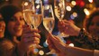 © mirifadapt - group of friends toasting with champagne as they watch the countdown