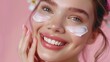 © pinkrabbit - Beautiful woman smile use cream for good skin. face of a healthy woman apply cream and makeup. Advertisement for skin cream, anti-wrinkle, baby face, whitening, moisturizer, tighten pores.