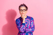 © deagreez - Photo portrait of attractive senior woman thoughtful look empty space dressed blue colorful clothes isolated on pink color background