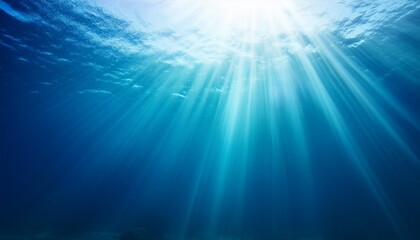 sun shining light in blue clearly deep water sunbeams illuminate the blue underwater sea scene background