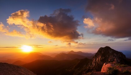 Wall Mural - timelapse of mountain horizon at sunset with passing clouds golden hour