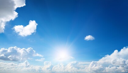 sunny background blue sky with white clouds and sun