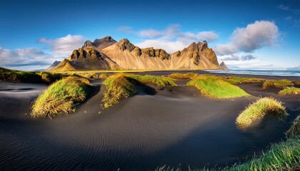 sand dunes on the stokksnes on southeastern icelandic coast with vestrahorn batman mountain iceland europe