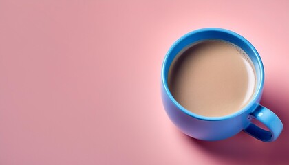 Wall Mural - blue coffee cup on pink background