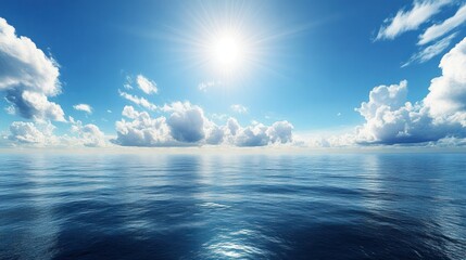 calm ocean surface with bright sun and clouds