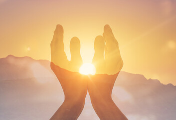 hands in the sky holding the sun, worship, prayer, religious concept 