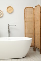 Sticker - Folding screen and tub in bathroom. Interior design