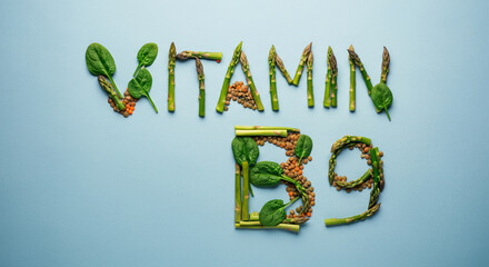 Vegetables and legumes forming vitamin B9 text on blue background