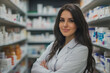 © lashkhidzetim - woman in a white lab coat stands in front of a pharmacy with a smile on her face
