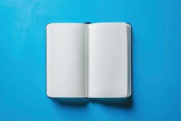 Canvas Print - a open White Notebook with Blue Background with generative ai