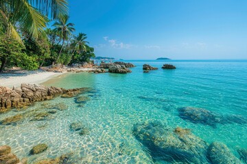 Sticker - Tropical Beach with Clear Turquoise Water and Rocky Shoreline