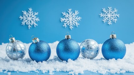 Wall Mural - blue christmas background with snowflakes and christmas balls. copy space backgrounds
