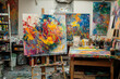 © AungThurein - An artist’s studio filled with canvases, brushes, and paint splatters