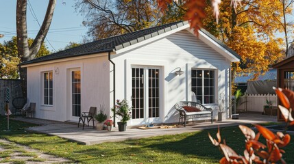 Poster - A white house with a black roof and a white trim