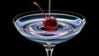 © Kartik - Maraschino cherry dropped in cocktail glass with fluid isolated on black