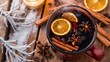© Kartik - Close up view of hot mulled wine drinks with spices and orange pieces on wooden tabletop