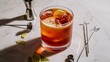 © Kartik - Glass of tasty Long Island iced tea, ice cubes and bartender tools on light background