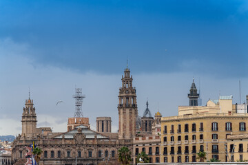 Old buildings view from the port of Barcelona - the most touristic attraction in the city.