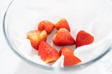 Poster - Washed and Dried Strawberries Neatly Stored in a Glass Bowl