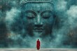 © Lubos Chlubny - Buddhist monk looking up at giant buddha statue in clouds