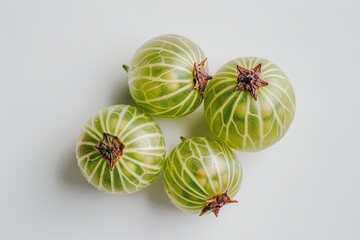 Canvas Print - Four Green Gooseberries on White Background