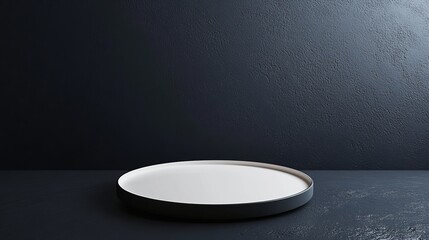 Poster - A white plate is on a black table