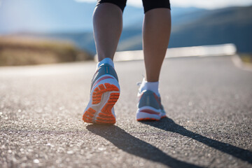 Poster - Fitness woman runner running at sunset mountain top road