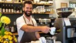 © munawaroh - A barista smiles while serving coffee in a cozy café setting.