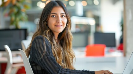 Professional business woman learning and writing financial report by using computer while sitting at modern office. Attractive smart female leader looking marketing strategy while typing plan. AIG51.