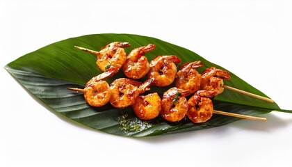 grilled shrimp skewers on tropical leaf with spicy sauce