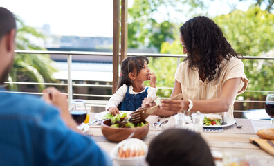 Wall Mural - Mother, girl and outdoor by table for lunch with food for prepare feast, happy and together for festive holiday. Mom, daughter and home for thanksgiving celebration, tradition and family with love.