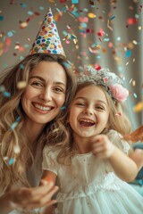 Sticker - A woman and a little girl are smiling and posing for a picture. The woman is wearing a party hat and the girl is wearing a white dress. Scene is happy and celebratory