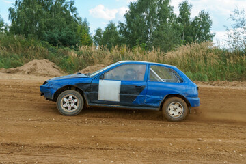 Autocross on a dirt track. rally race. Off-road racing. Training races of racing drivers. Modern modified cars on the road.