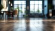 © Matthew - A blurred view of a modern interior space with wooden flooring and bright windows.