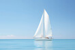 © Gun - Sailboat Serenity: A graceful white sailboat glides across the turquoise waters, its sails billowing in the gentle breeze, under a boundless blue sky.  The image evokes a sense of calm and peace, a pe