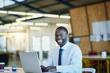 Fototapete - Financial, portrait or happy businessman on laptop in office for research or savings on taxes review. Finance, investment or African accountant on technology for startup, accounting or sale profit