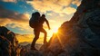 © elimicel - A male climber climbs a rugged mountain terrain during a stunning sunset.