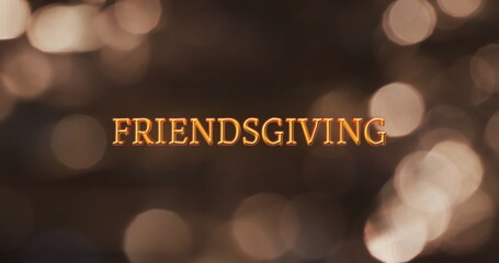 Wall Mural - image of friendsgiving text and flickering spot lights on brown background