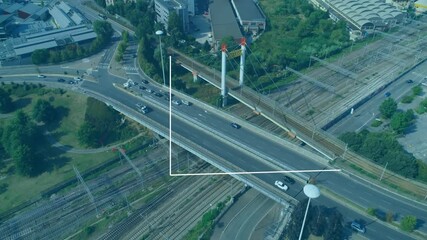 Poster - Line graph animation over aerial view of urban roads and railway tracks