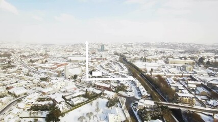 Poster - Bar chart animation over aerial view of snowy cityscape