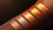 © ธนากร บัวพรหม - Close-up of arm with glittery eyeshadow swatches in gradient shades of gold, showcasing makeup variety and skin tones.