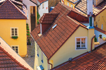 Wall Mural - Cityscape - view of the roofs of the houses of the Novy Svet ancient quarter in the Hradcany historical district, Prague, Czech Republic