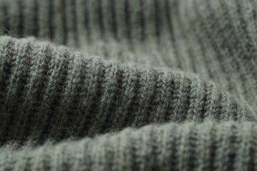 Sticker - Texture of grey knitted fabric as background, closeup