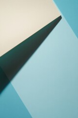 Poster - A minimalist composition showcases a light blue and beige diagonal surface, emphasizing the clean lines and simplicity of the layout, perfect for product displays