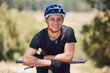 © Michael Cunningham/peopleimages.com - Sports, happy and portrait of man on bicycle for training, workout and exercise in countryside. Fitness, cycling and person with mountain bike for adventure, outdoor and adrenaline on dirt trail
