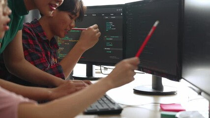 Slow motion back end software developer engineer for computer programming working together on debugging writing computing code, solving complex algorithms display on monitor in office. Burgeoning