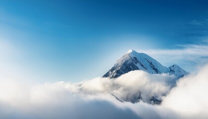 Poster - mountain peak visible high in the sky through the clouds