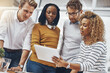 © BestCam/peopleimages.com - Tablet, team and creative business people planning, problem solving or brainstorming idea. Tech, group and discussion for project, research or solution with campaign manager in low angle at startup