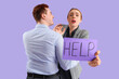 © Pixel-Shot - Business woman holding paper with word HELP and her male colleague on lilac background. Harassment concept